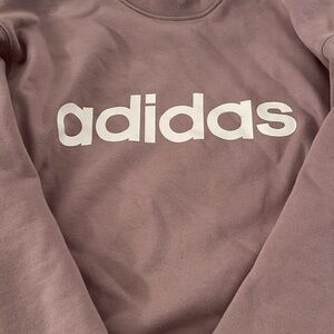 Sweat shirt and pants for a cute outfit. It is a beautiful mauve color.